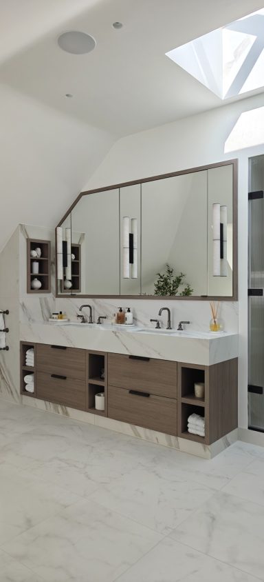 Grey Vicenza Oak four drawer vanity with framed mirrored wall cabinet. Modern bathroom featuring a double sink, large mirror, and stylish cabinetry.