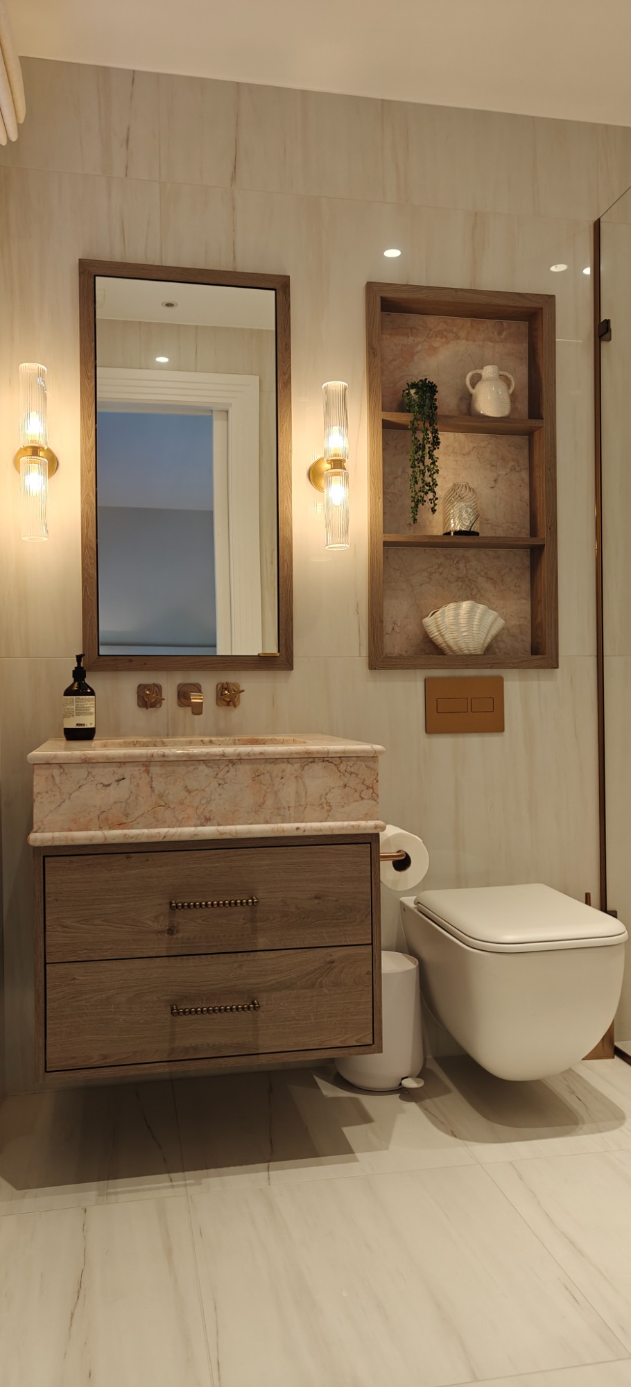 Truffle Brown Denver Oak two drawer vanity with framed mirrored cabinet. Modern bathroom featuring a wooden vanity, mirror, shelves, and a toilet.
